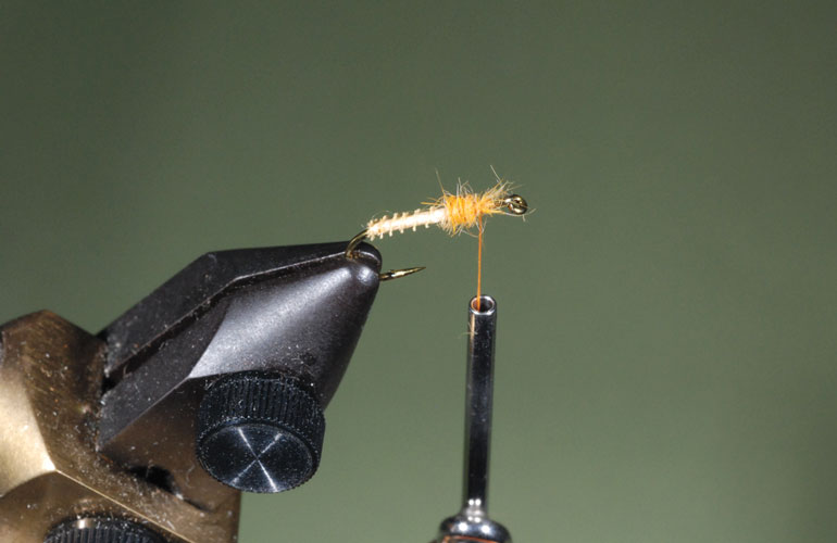 //content.osgnetworks.tv/flyfisherman/content/photos/How-to-Tie-the-Puff-Diddy-Fly-Step-2.jpg