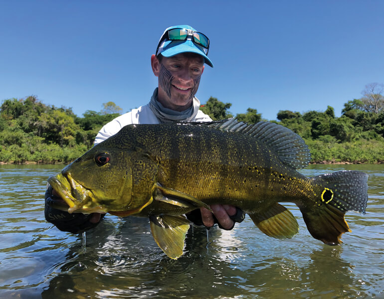//content.osgnetworks.tv/flyfisherman/content/photos/Untamed-Angling-Ross-Peacock-Bass.jpg