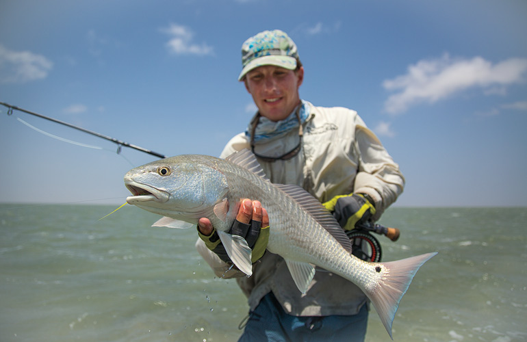 //content.osgnetworks.tv/flyfisherman/content/photos/Wading-for-Texas-Redfish-at-Laguna-Madre.jpg