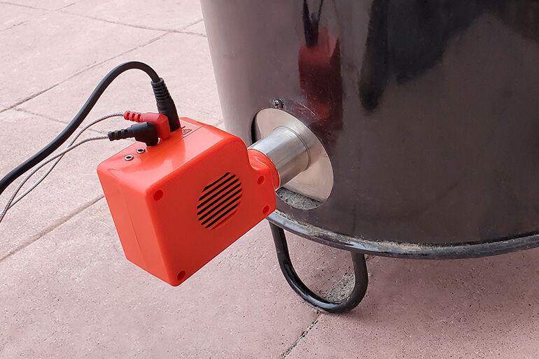 Smartfire controller attached to Pit Barrel Cooker