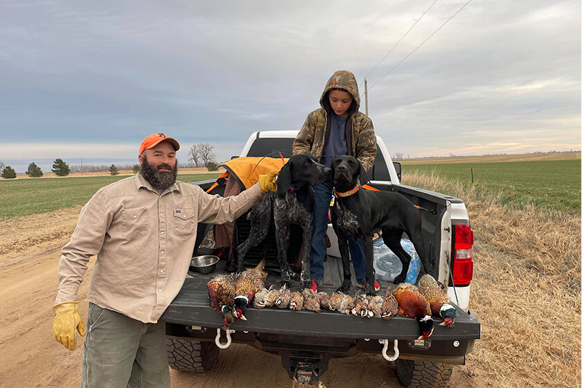 hunters with a haul of birds