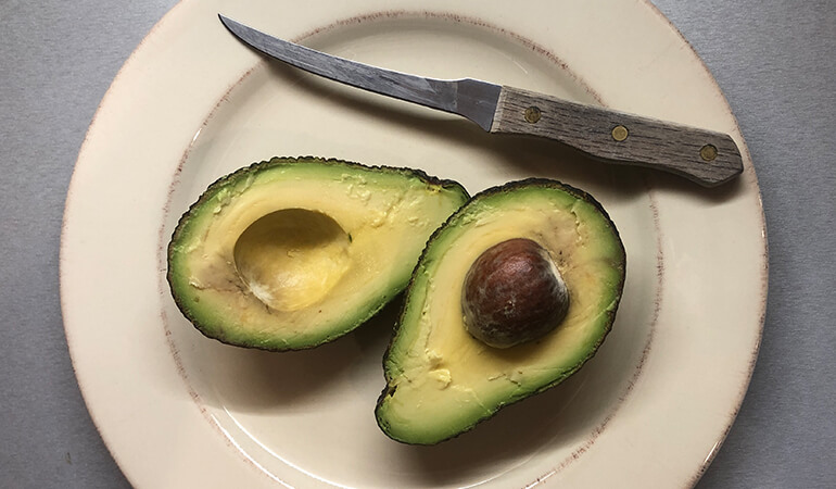 halved avocado plate