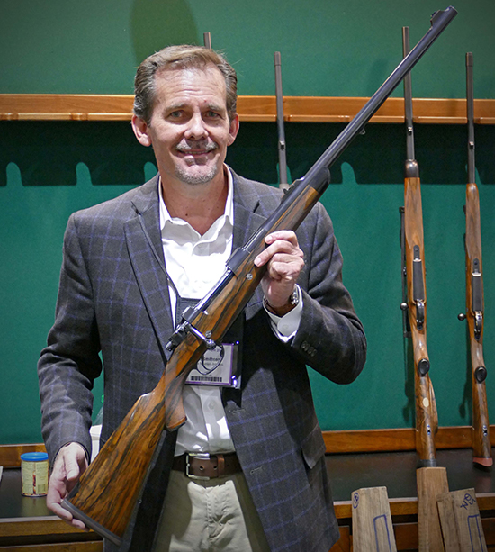 JP Smithson holding rifle