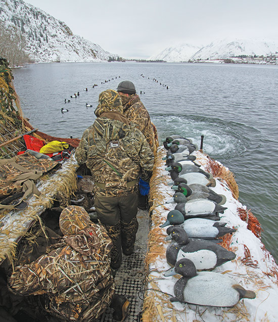 duck hunters with long line decoy spread