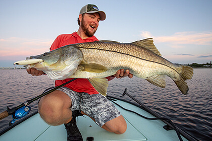 Brenton Roberts holding an overslot snook caught on Yo-Zuri Hydro Pencil in Bone