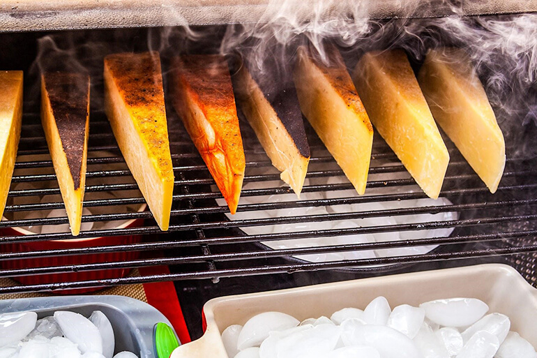 smoked-cheese-on-grill-grates-with-smoke
