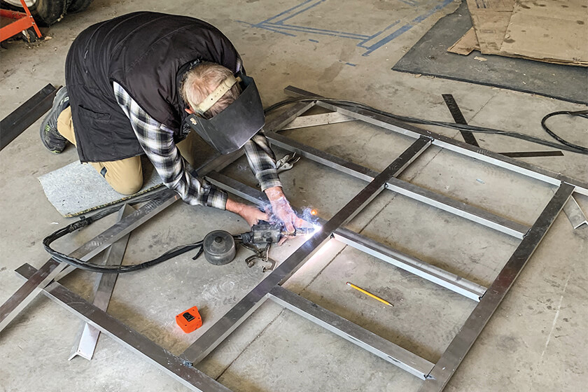 Welding a truck bed system