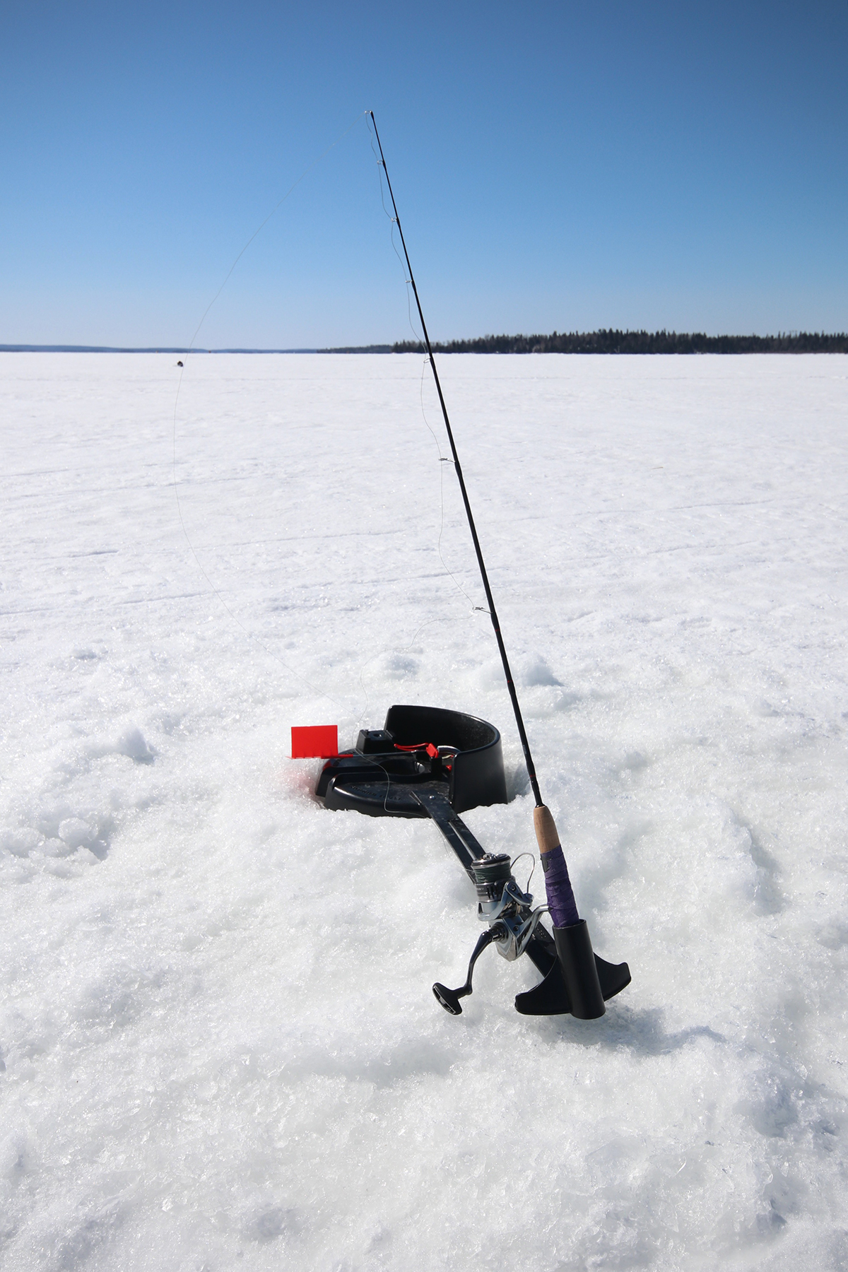 I caught a MONSTER with an ICE FISHING ROD!! (Chasing the one that