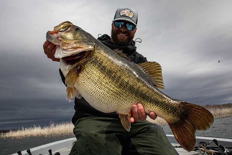 The BIGGEST BASS I've EVER Seen River Fishing 