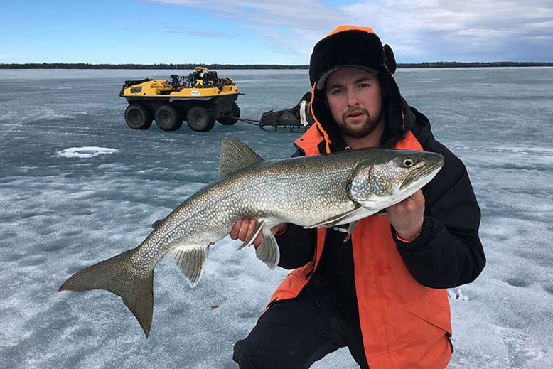 Lake trout through the ice with Caribou Lodge in Manitoba