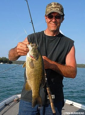 Local angler Jere Johnson shows off a nice Michigan smallmouth bass.