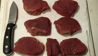 Venison backstrap steaks sliced