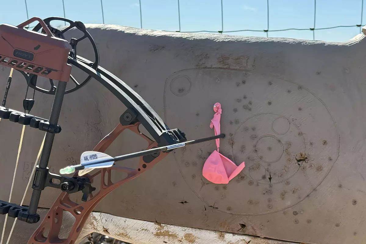 balloon popped by an arrow