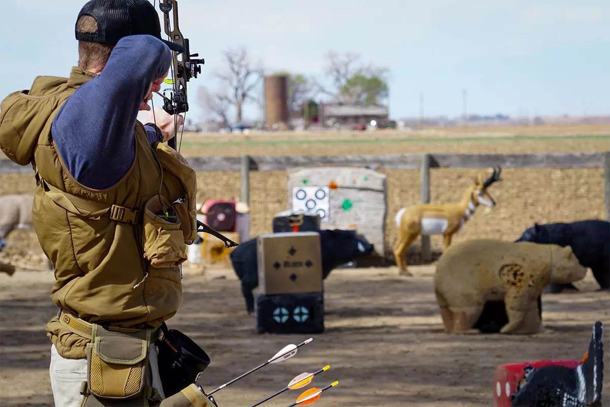 Archery at full draw on target