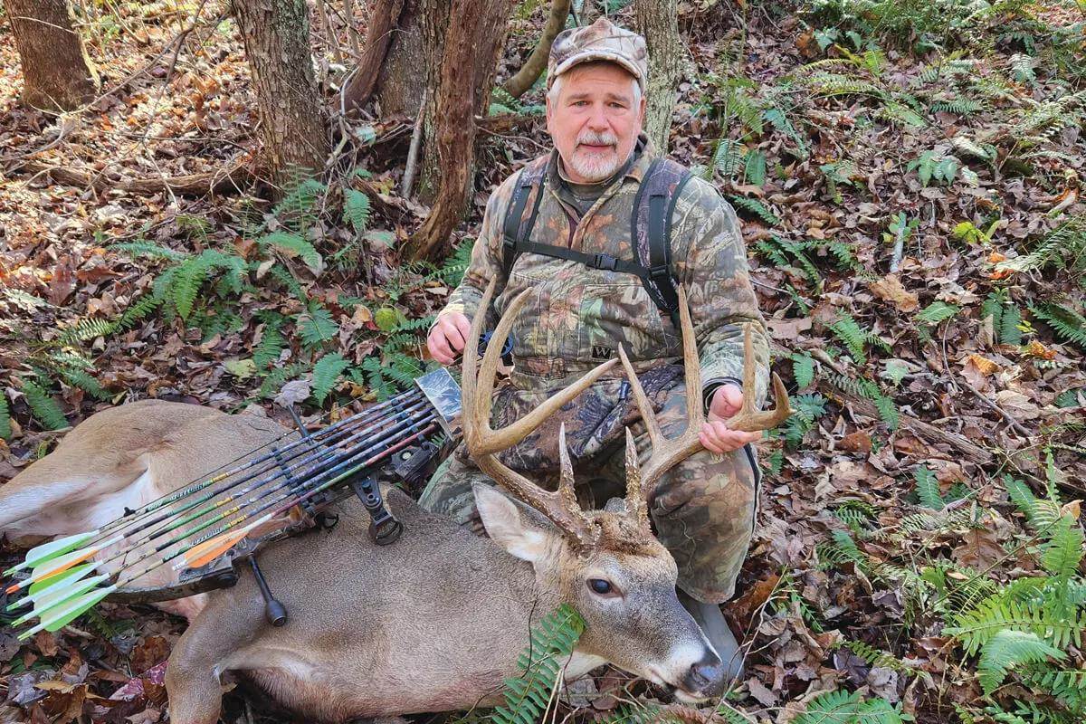 bowhunter with big public-land Ohio whitetail buck