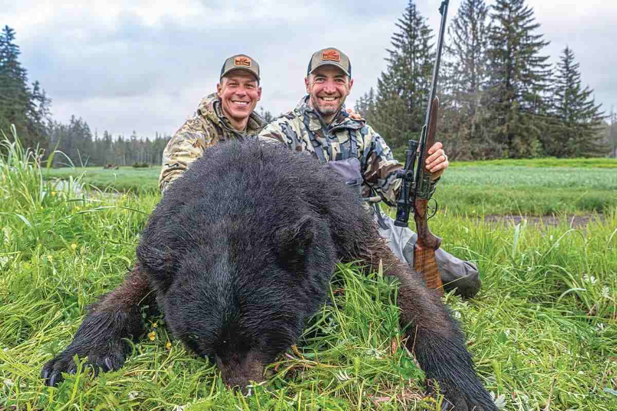two hunters and bear