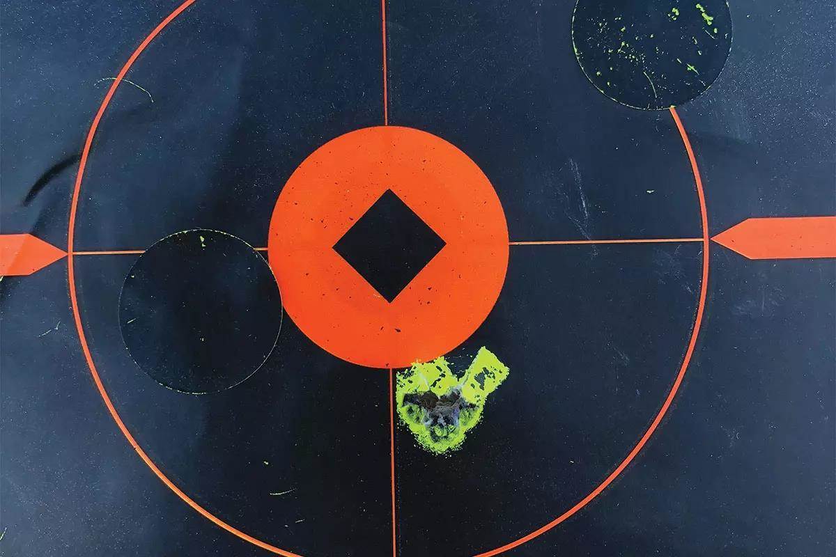 Target showing group from rifle at 100-yards