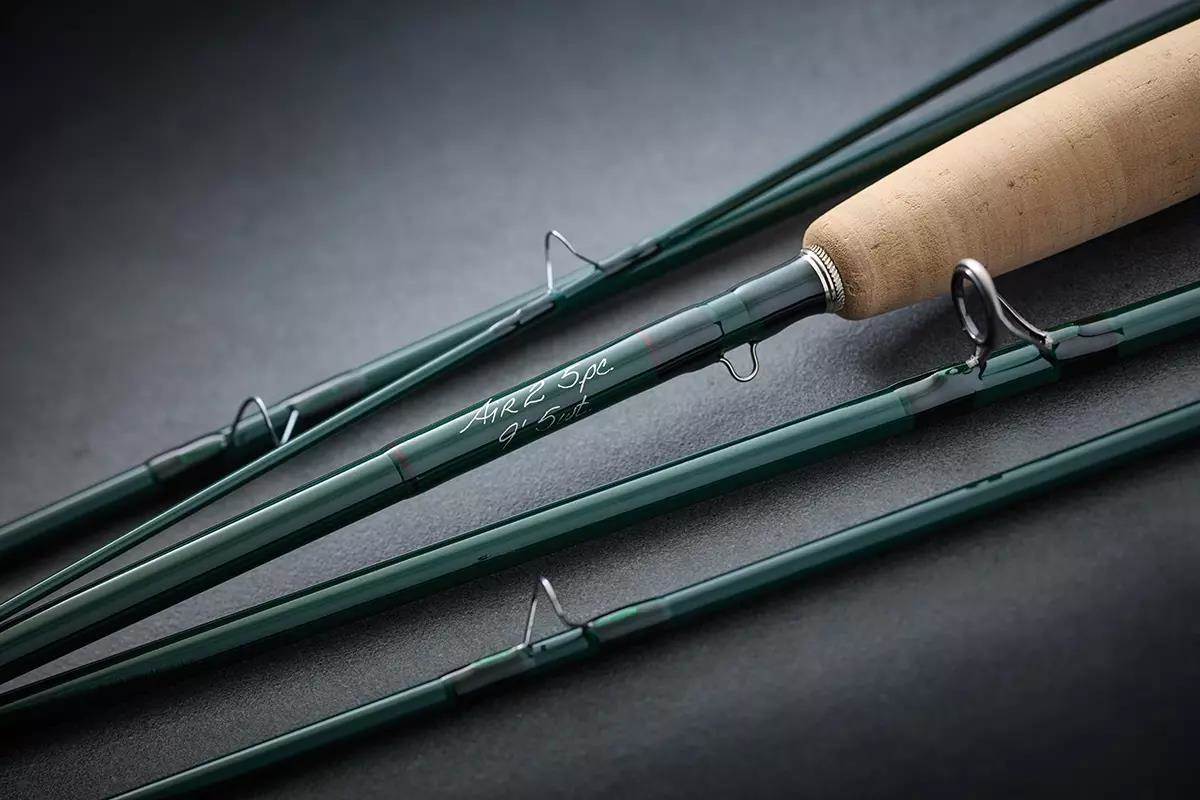 Studio photo of a broken-down five-piece Winston fly rod. 