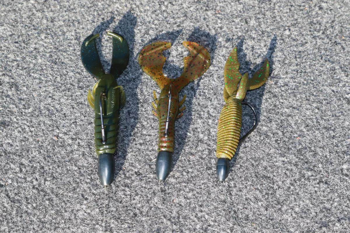 Three plastic bass lures with sinkers
