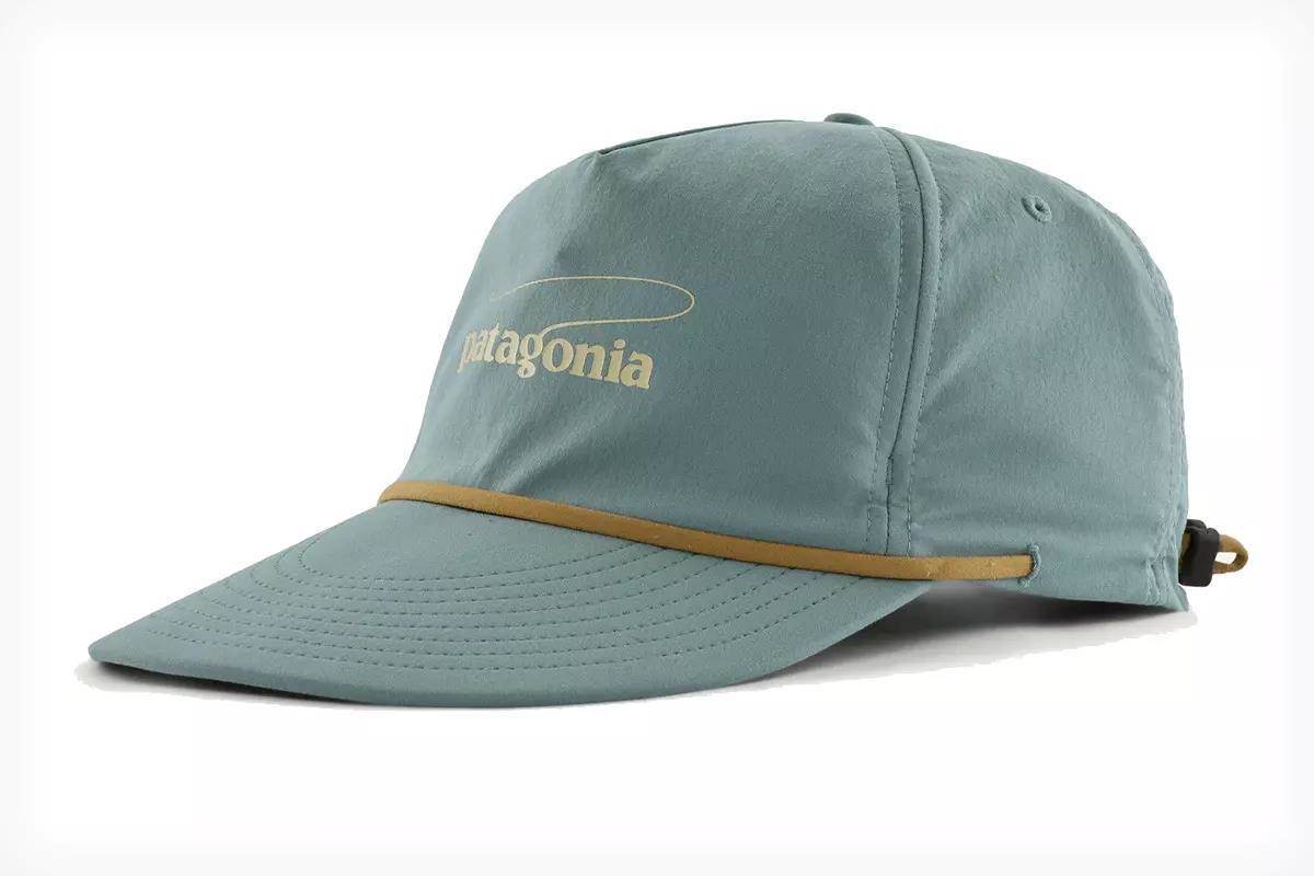 Studio photo of a teal Patagonia baseball cap.