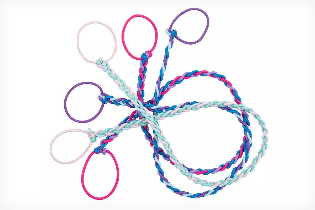 Studio photo of colorful braided-strand hair ties