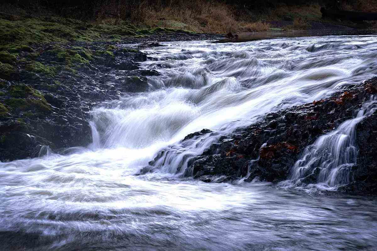 A small waterfall along the Chehalis River in Washington; extended shutter-speed image of a waterfall.