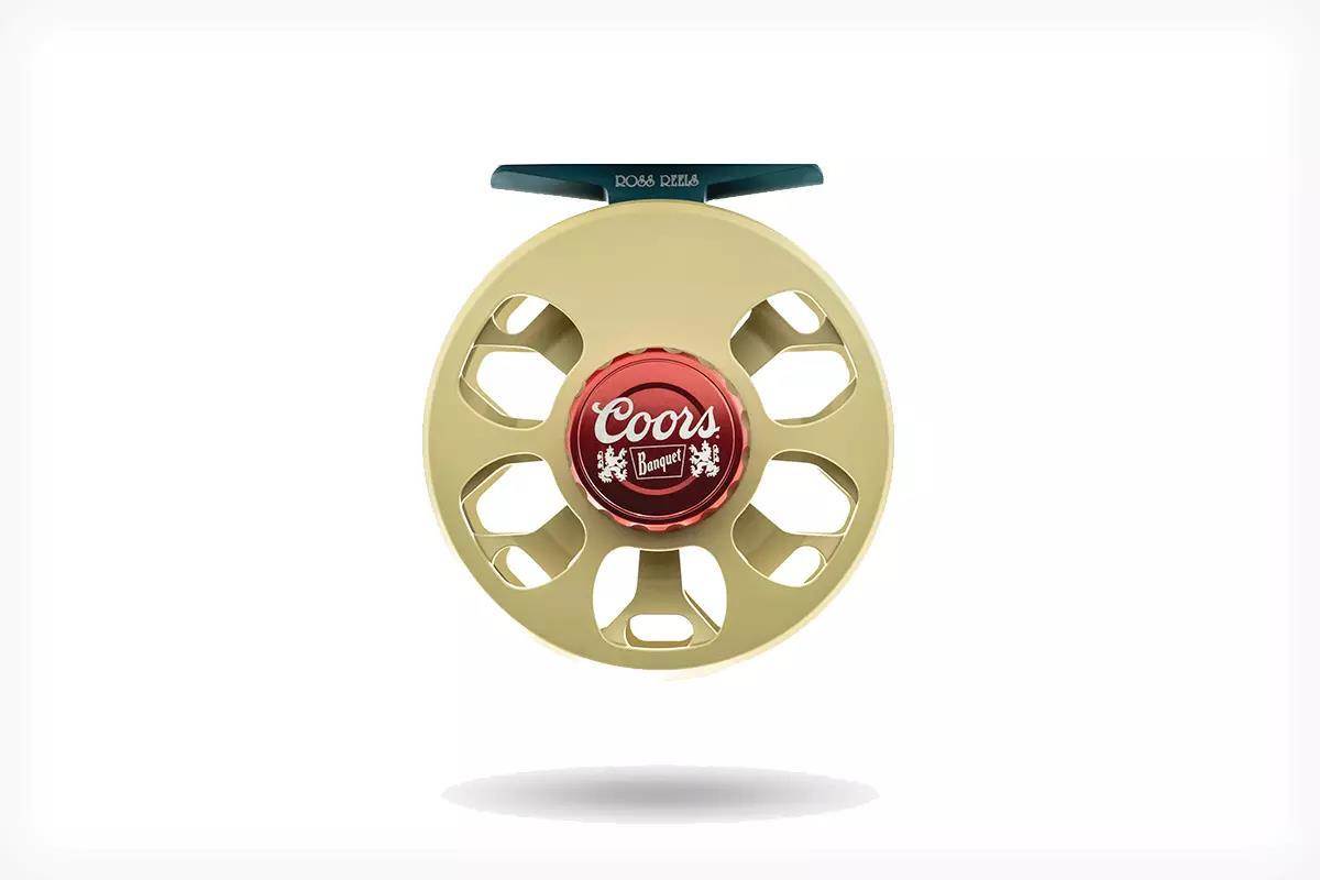 Studio photo of a Ross Cimarron fly reel with the Coors Banquet branding.
