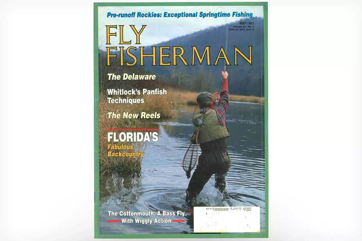 The cover of the May 1991 issue of Fly Fisherman showing a fly angler hooked up to a fish in a river.