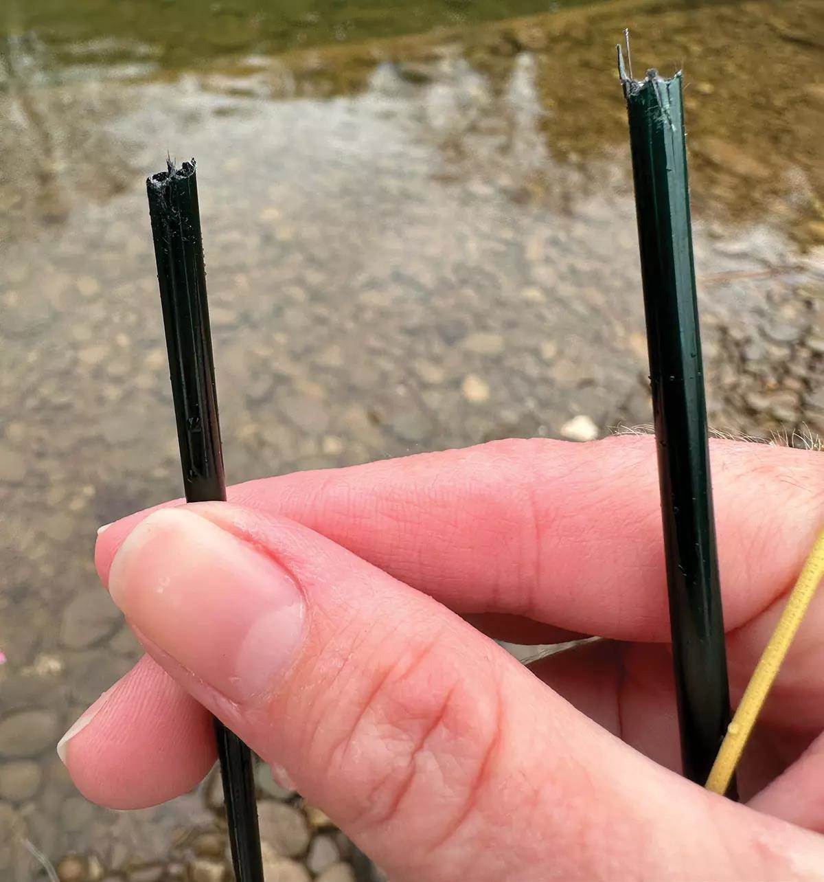 Two sections of a broken fly rod. 