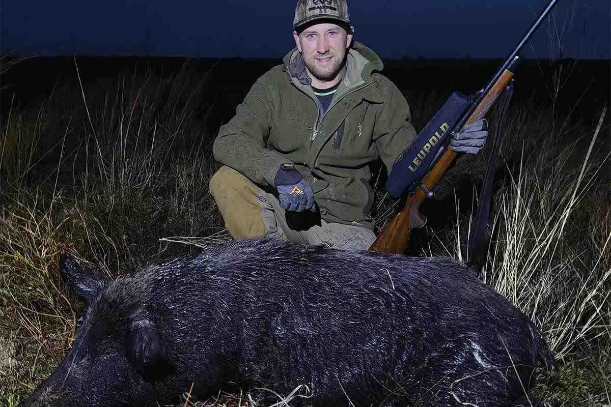 hunter with boar