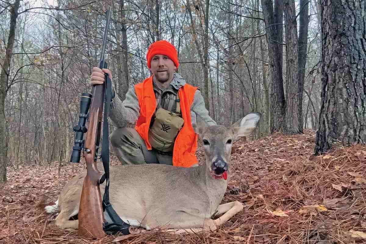 hunter with doe