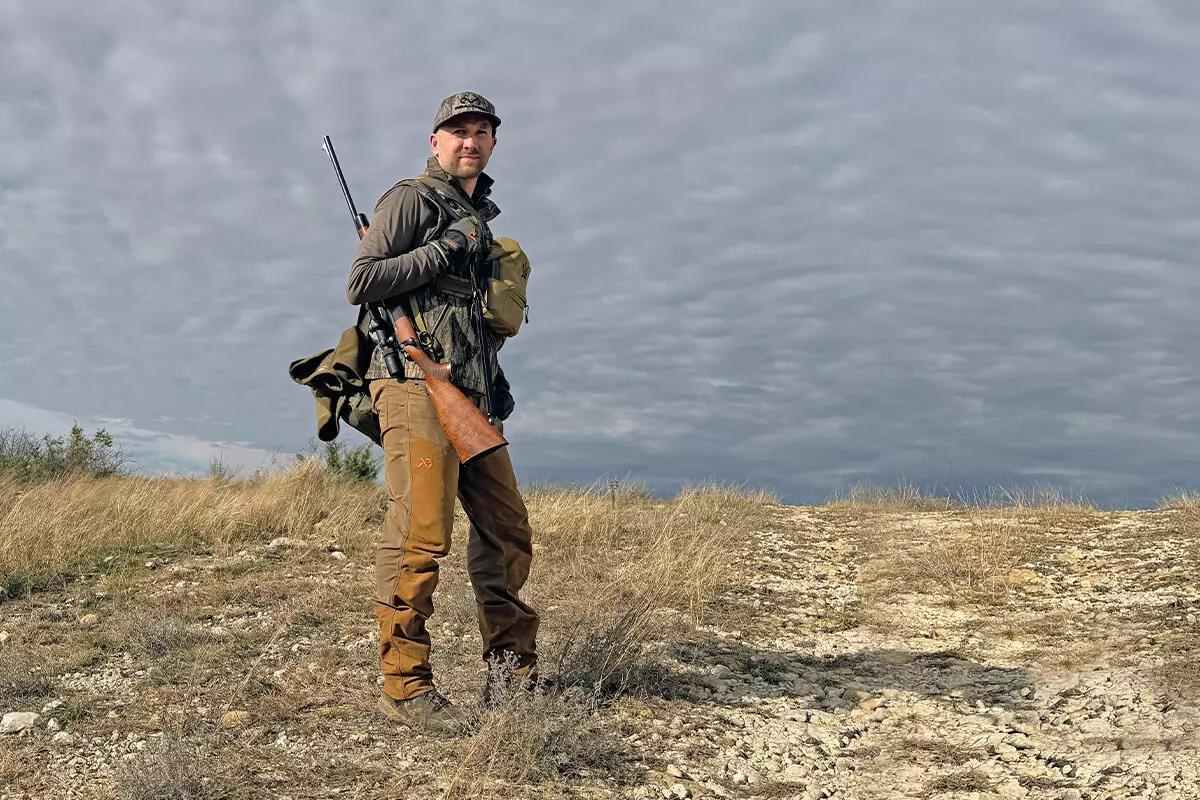 hunter with slung rifle