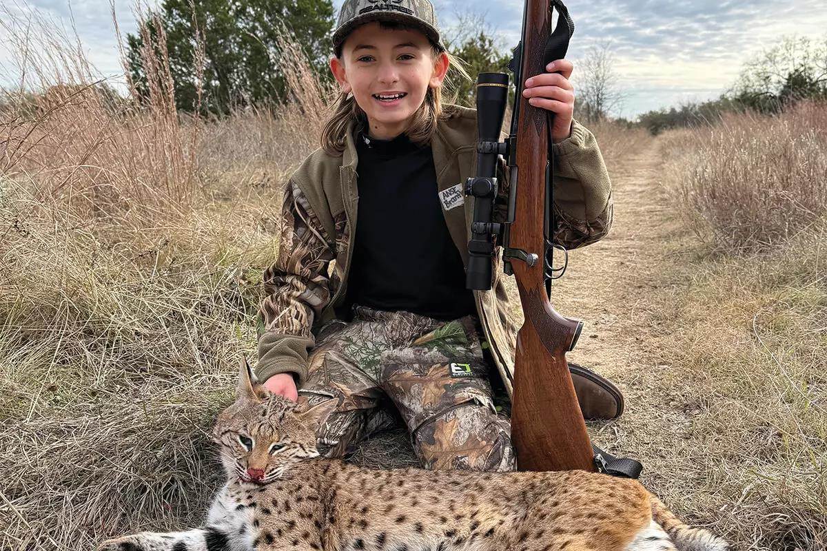 youth with bobcat