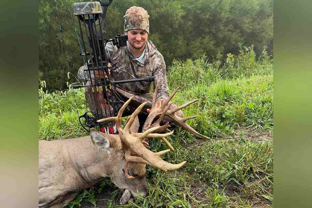 Hunter with buck