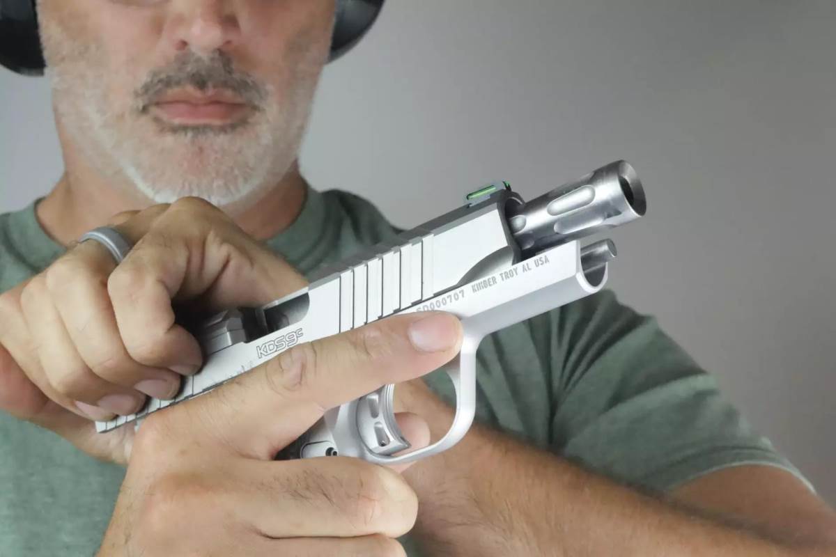 Author Brad Fitzpatrick racks the Kimber KDS9c 9mm Compact