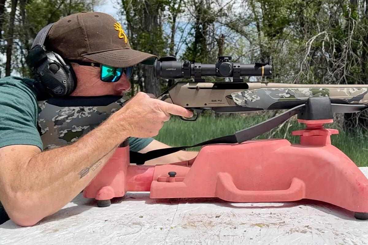 man shooting at the bench