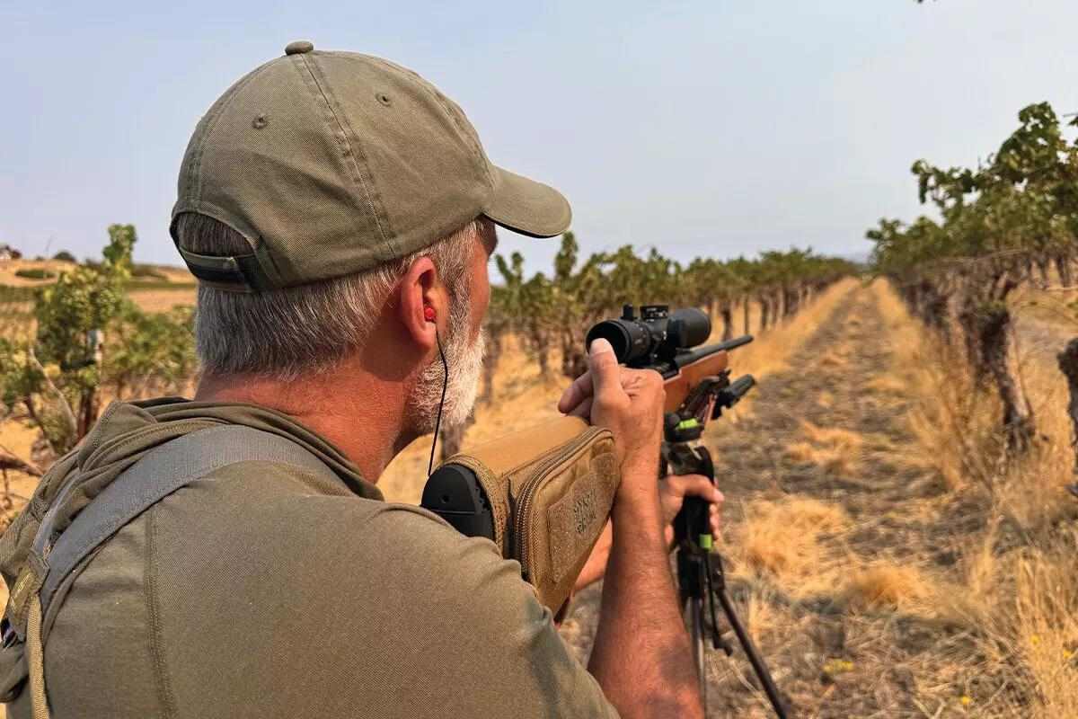 man waiting for shot opportunity