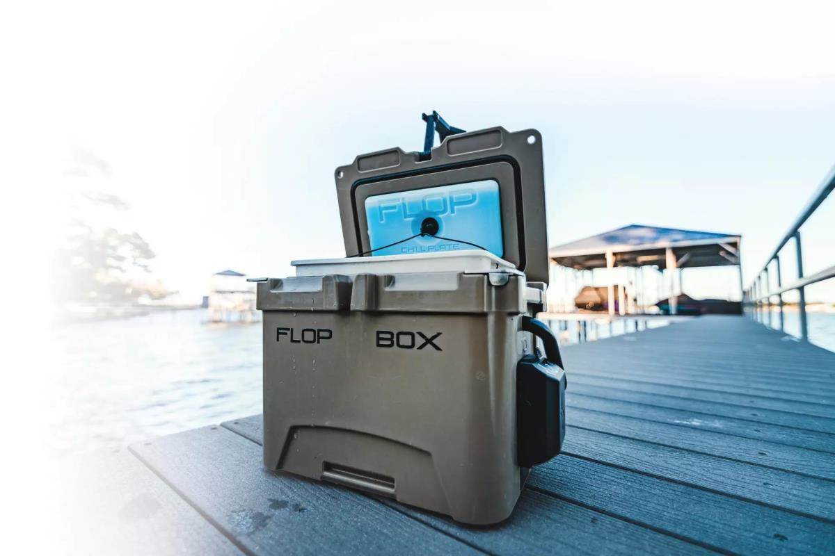 Photo of Flop Box 10 cooler on a deck on a lake.