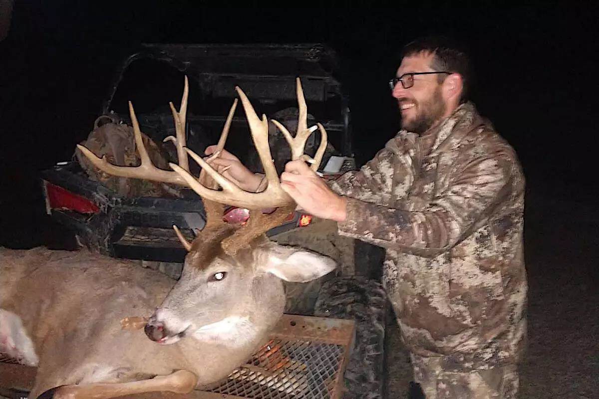 hunter posing with massive ohio buck