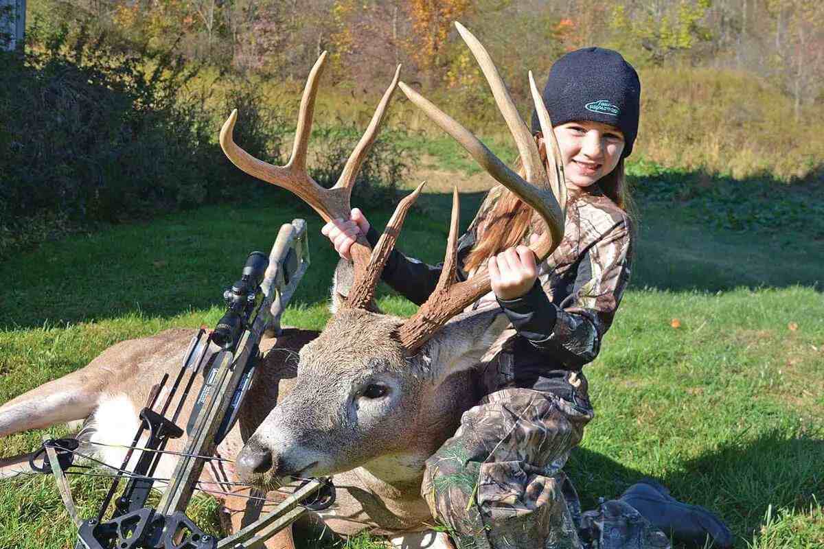 girl with first ohio whitetail buck taken by crossbow