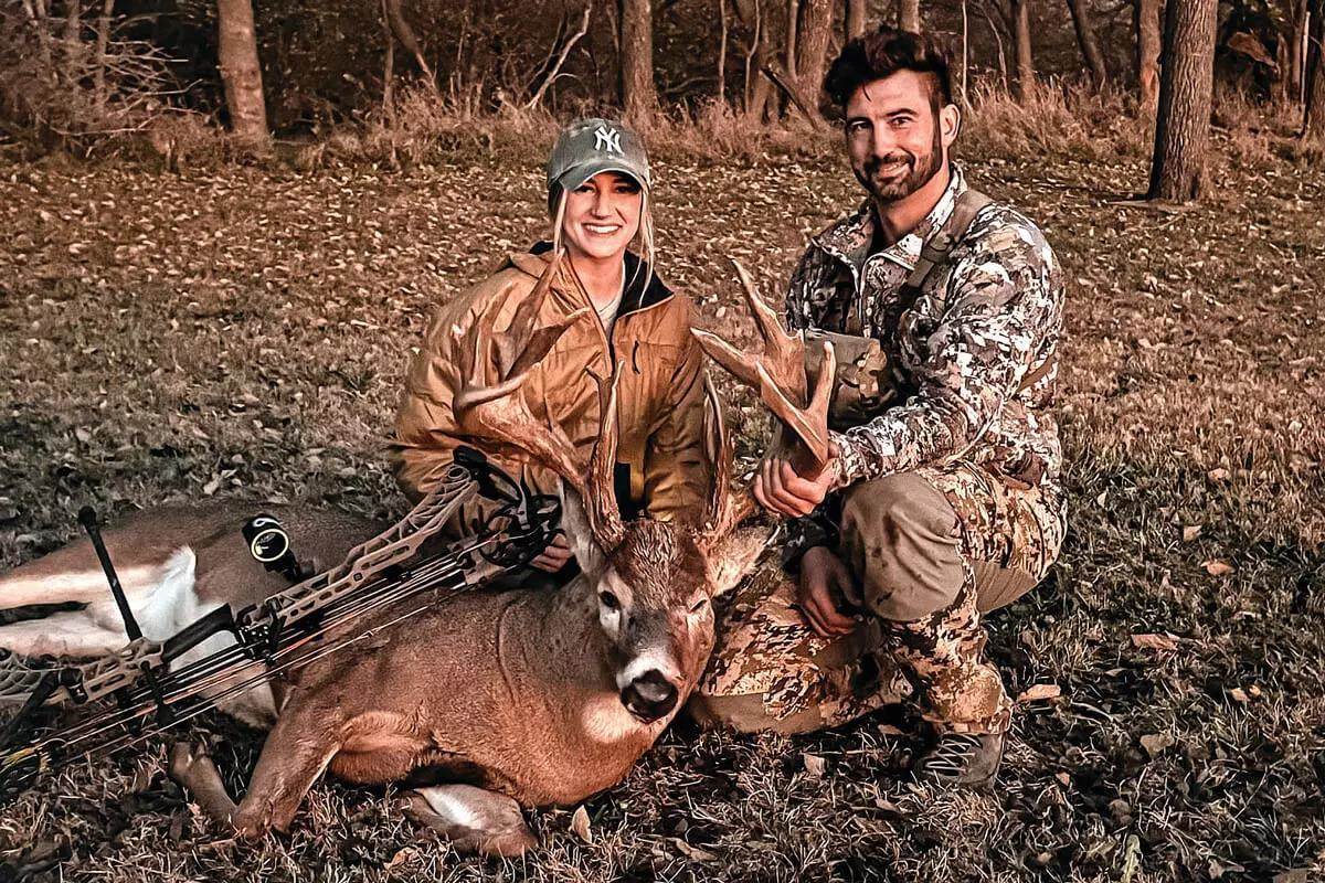 husband and wife with non-typical Kansas whitetail buck in 2024