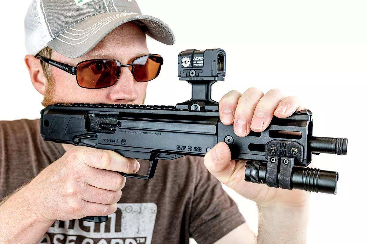 D. Faubion aiming the Ruger LC Charger 5.7x28 cheek pistol