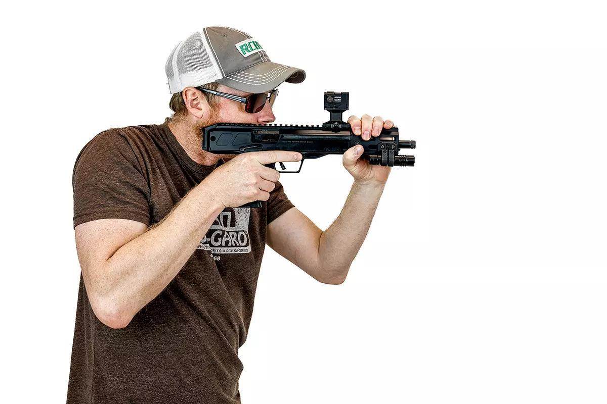 Author aiming the Ruger LC Charger 5.7x28 cheek pistol