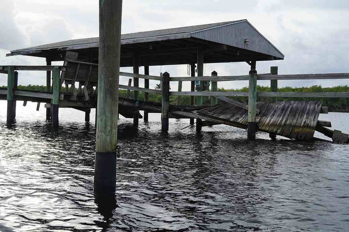 destroyed saltwater boat dock in a river