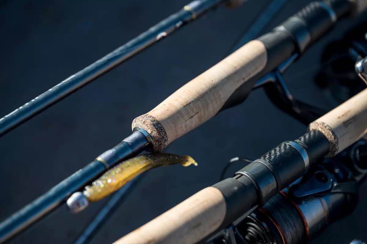 A closse-up photo of three fishing rods with cork handles. 