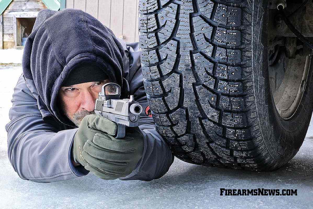 Author shooting behind tire