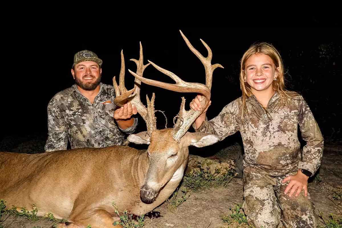 Hunter with buck