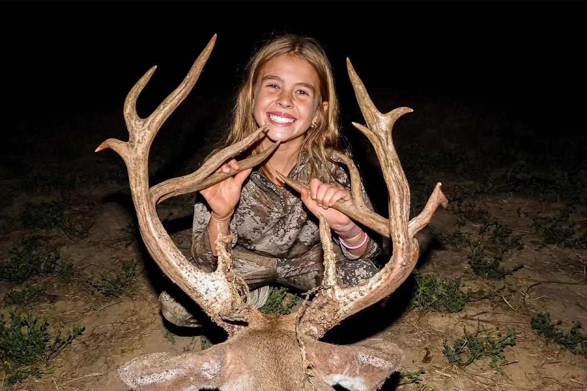 Hunter with buck