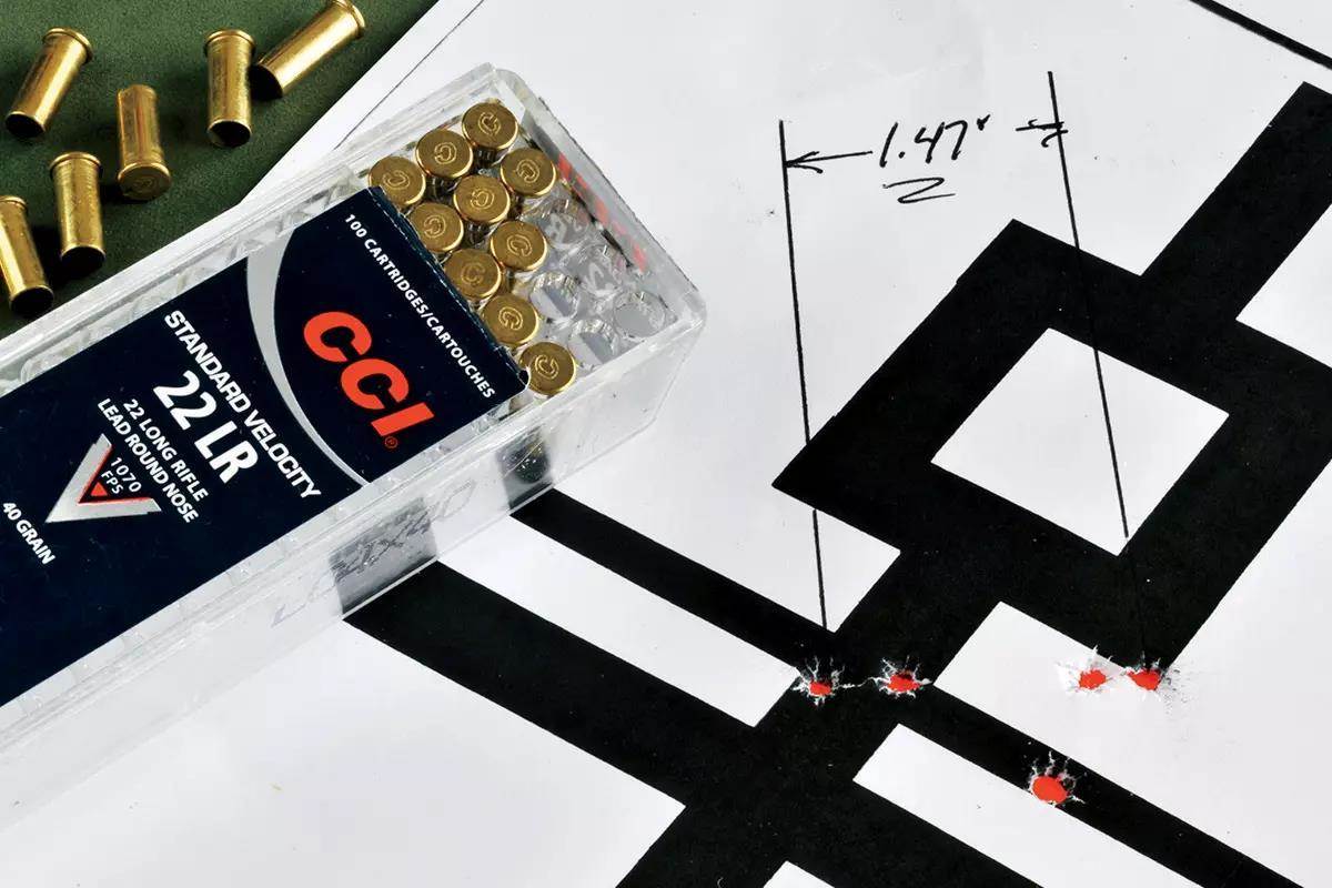 Target showing shot group and box of CCI Standard Velocity .22 LR Ammunition