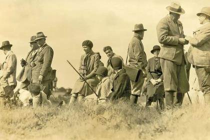 An old black and white photograph of a field trial.
